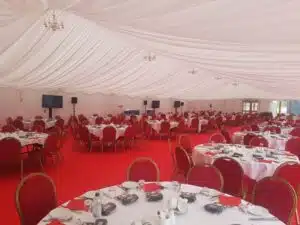 Corporate Marquee Set Up with Red Theming